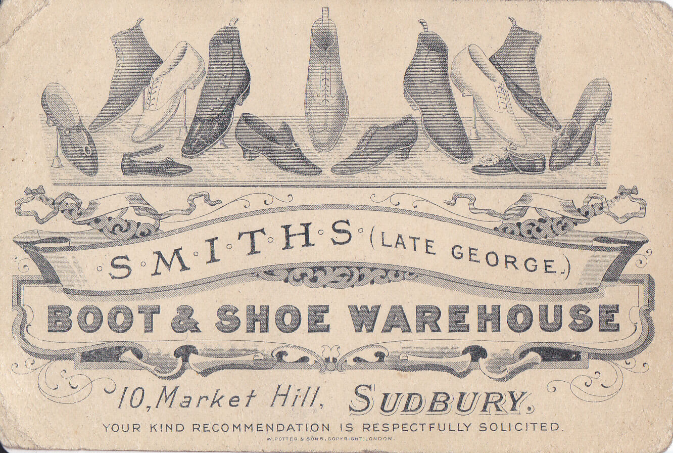 A newspaper clipping of an advert with the words 'Boot and Shoe Warehouse' and the business name and address